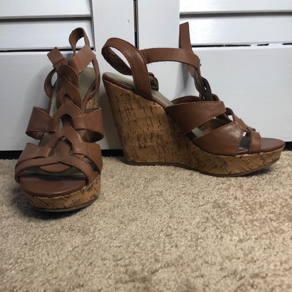 Tan wedges with braided front.